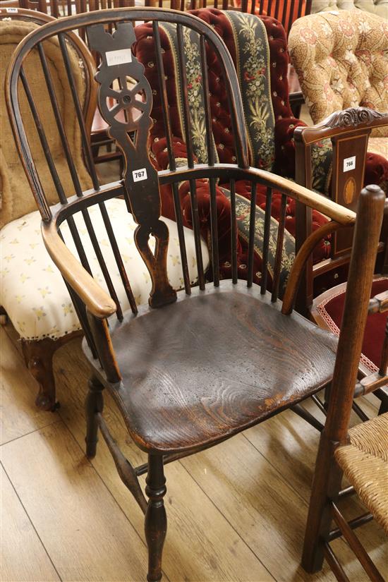 A wheelback Windsor chair